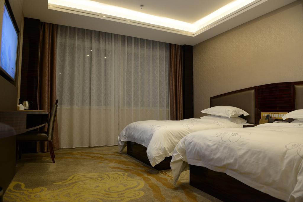 Tie Cheng Hotel Гуанчжоу Номер фото